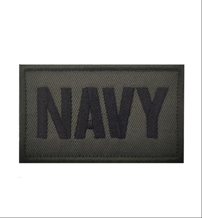 Black 'NAVY' patch with measurements on a white background